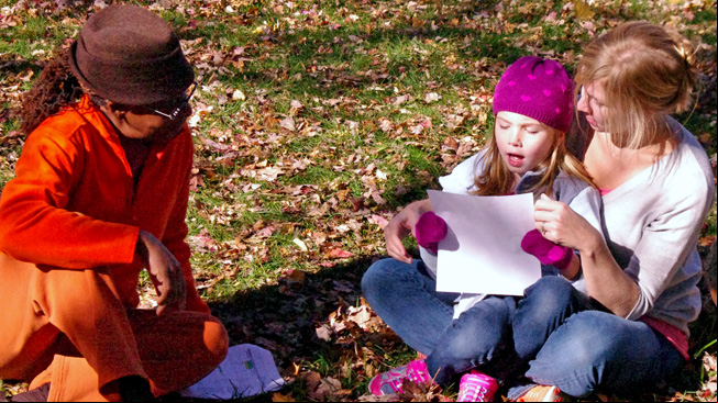 Educator talks with kids